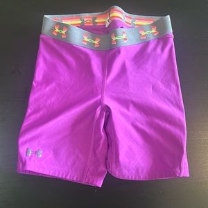 Woman’s purple UNDER ARMOUR Lightly padded compression shorts Medium